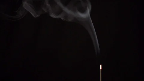 Reverse slow smoke from mindfulness incense stick, abstract Stock Footage 112287653
