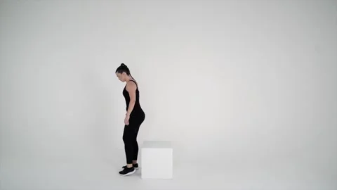 Reverse Step-Up (Using a Stable Chair) Stock Footage 314193963