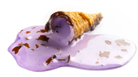 Reverse studio shoot sweet potato flavor ice cream melting on white time lapse Stock Footage 92293701