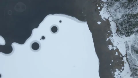 Reverse Top Down Shot Of Frozen Lake In North Finland At Lake Inari Stock Footage 221486301