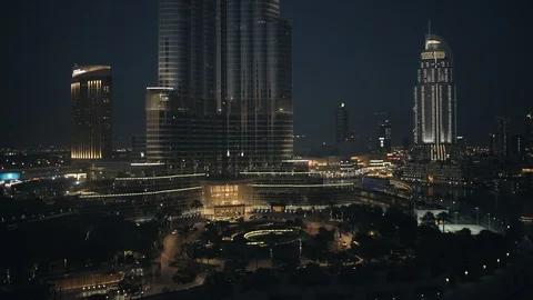 Reverse track from base of Burj Khalifa at 60m, night. Stock Footage 98957827