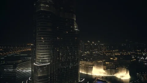 Reverse track from base of Burj Khalifa at 60m, night. Stock Footage 98958621
