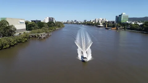 Reverse tracking aerial view of boat on River Stock Footage 90217096