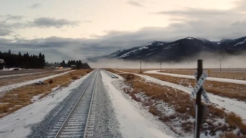 Reverse tracking shot past railroad signs Stock Footage 124927201