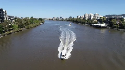 Reverse tracking view of boat cruising on river Stock Footage 90270854