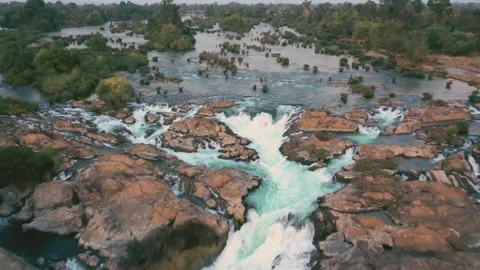 Reverse travelling of Li Phi Somphamit Waterfalls at sunset. Don Det, Laos. Stock Footage 246939180
