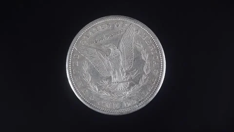 Reverse Of The United States Morgan Silver Dollar Featuring A Bald Eagle. Stock Footage 323434573
