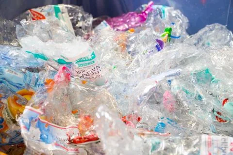 Reverse vending machine, PET crusher, crushed plastic bottles Stock Photos