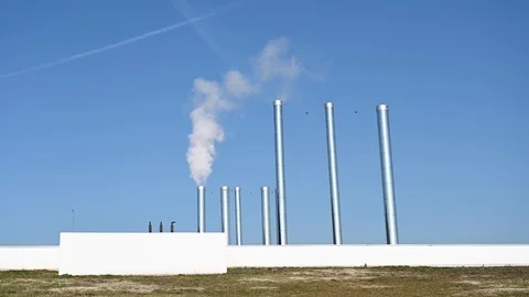 Reverse video of smoke coming out of an industrial chimney Stock Footage 103410163