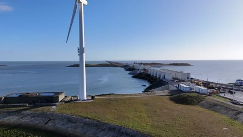 Reverse view toward harbor and turbine beside the locks Stock Footage 331839097