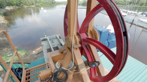 Reversible winch closeup. In the background wakeboarder rides Stock Footage 56174492