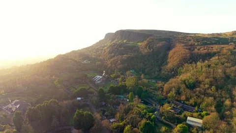 Reversing 4K 60FPS aerial view of Cave Hill and Belfast Zoo in North Belfast Stock Footage 325846012