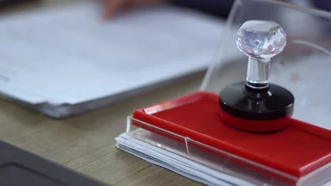 Review and proofread contract documents and sign and seal Video stock 198988720