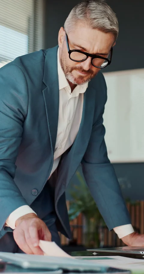 Review, man and laptop with documents in office for data analysis, policy update Stock Footage 332975539