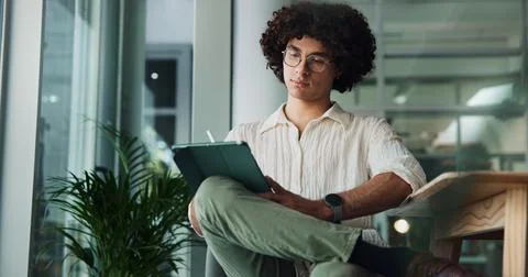 Review, tablet and creative man for problem solving, research project or email Stock Photos