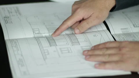 Reviewing Architecural Blueprints Stock Footage 40647837