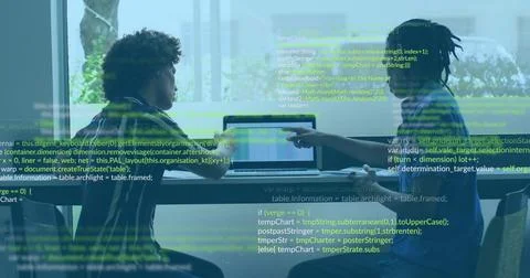 Reviewing code overlay two men collaborating on laptop in glass room, wearing Stock Photos