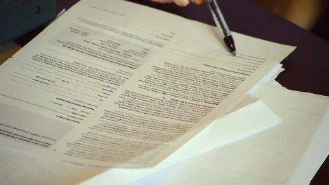 Reviewing Documentation Stock Footage 115895803