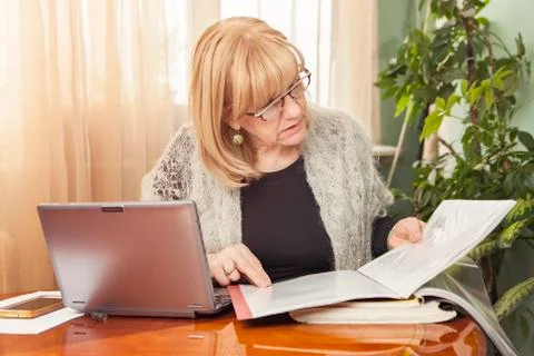 Reviewing documents and reports Stock Photos