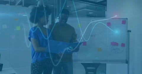 Reviewing documents with data animation, business colleagues at office Stock Footage 329028243