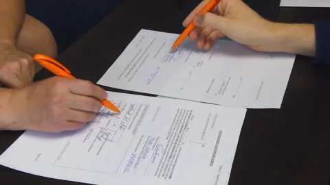 Reviewing The Documents Before The Handshake Stock Footage 100021849