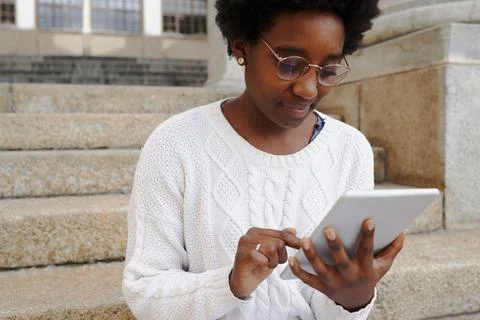Reviewing her notes before class Foto stock