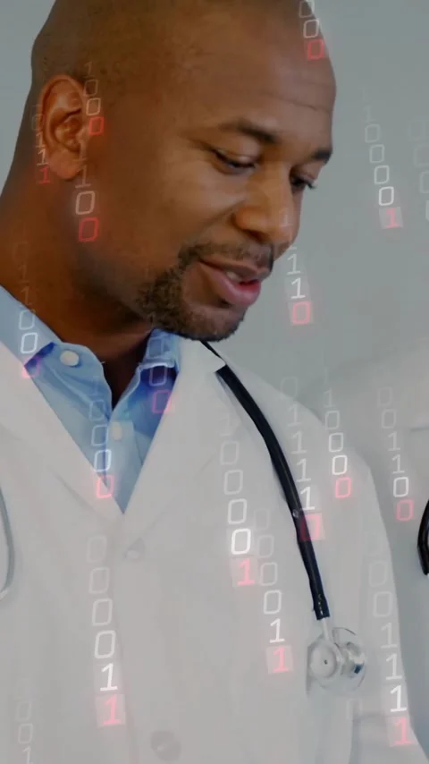 Reviewing information, doctors with binary code animation overlay in hospital Stock Footage 319617219