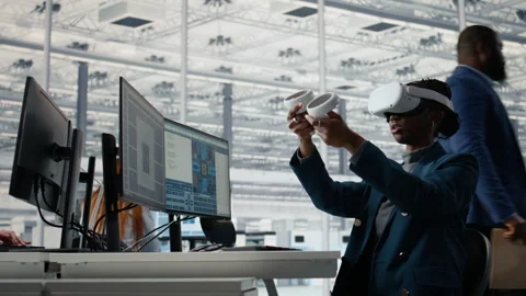 Reviewing microchip production, VR headset and woman in industrial plant Stock Footage 335880470