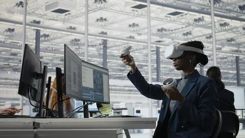 Reviewing microchip production, VR headset and woman in industrial plant Stock Photos