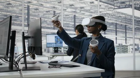 Reviewing microchip production, VR headset and woman in industrial plant Stock Photos