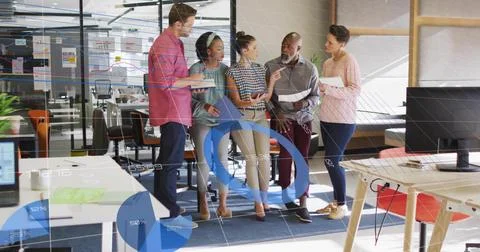 Reviewing project data five professionals collaborating in office, with tablet Fotos de archivo