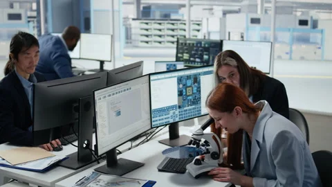 Reviewing semiconductor substrate structures, microscope and woman in office Stock Footage 335879317