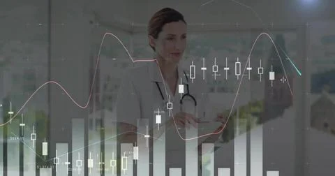 Reviewing tablet, doctor analyzing data overlays and line charts in clinic, Stock Photos