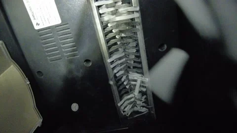 Revised documents. Remains of documents after disposal. Inside view. Destruct Video stock 221417121