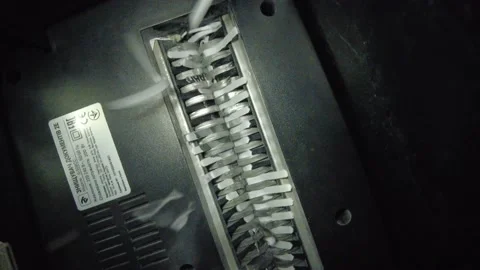 Revised documents. Remains of documents after disposal. Inside view. Destruct Video stock 221417151