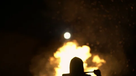 Revolution destructive behavior guy on the car with a baseball bat breaks glass Stock Footage 90960688