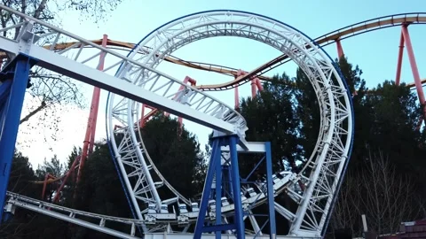 Revolution roller coaster at Six Flags Magic Mountain in California. Stock Footage 150847789