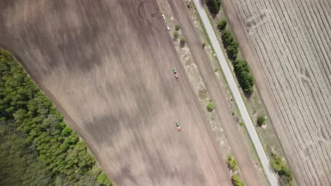 Revolutionizing Agriculture: A Drone's Eye View of Wheat Planting Stock Footage 234734389