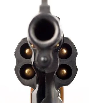 Revolver 38 caliber pistol loaded cylinder gun barrel pointed Stock Photos
