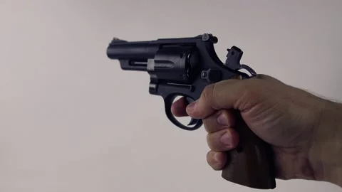 Revolver In The Man's Hand. Pulls the trigger Stock Footage 146669613
