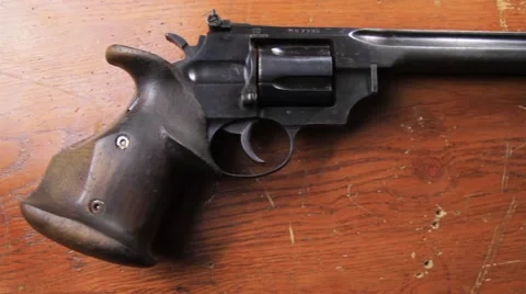 Revolver on a Table III 스톡 동영상 43016145