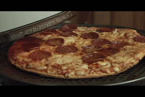 Revolving Cooking Pizza Video stock 10908449