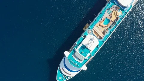 Revolving overhead view over the bow of German cruise ship moored in the port Stock Footage 123132813
