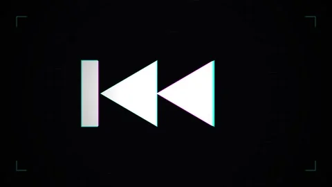 Rewind button digital glitch icon interface for media playback control Stock Footage 345554560