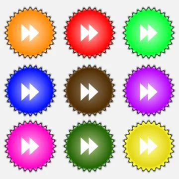 Rewind  icon sign. A set of nine different colored labels. Vector Stock Illustration