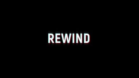 Rewind text animated word with retro glitch effect black background Stock-Footage 313461246