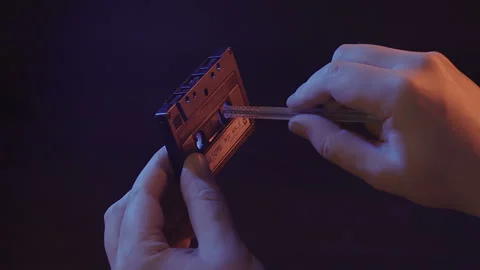 Rewinding a Tape with a Pen Stock Footage 100360830