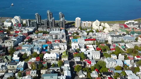 Reykjavik down town streets. oceanfront embankment and port. Aerial drone video Stock-Footage 90899439