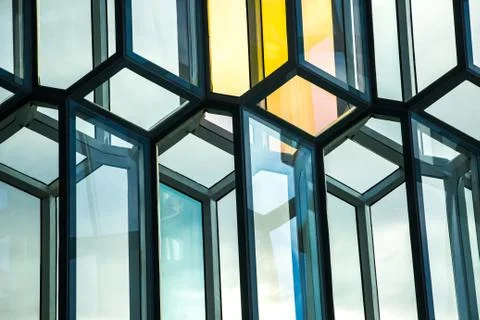 REYKJAVIK, ICELAND - 09/18/2018: Detail of colored glass at Harpa concert hall. Stock Photos