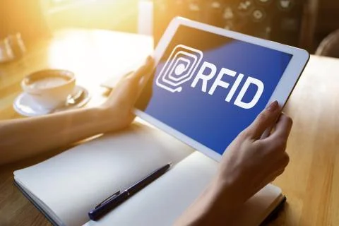 RFID Radio frequency identification technology concept on device screen 스톡 사진